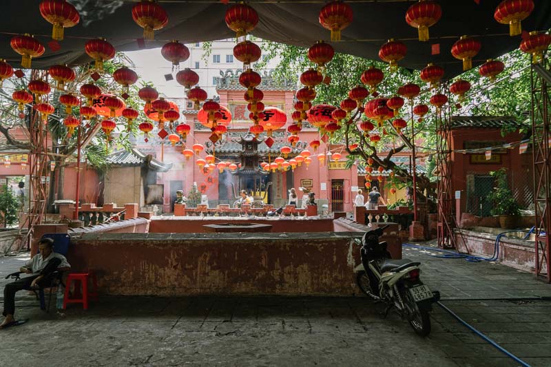 A courtyard filled with lanterns and Saigon Vietnam